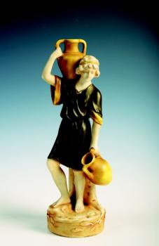 Muž nesoucí džbány Muž nesoucí džbány